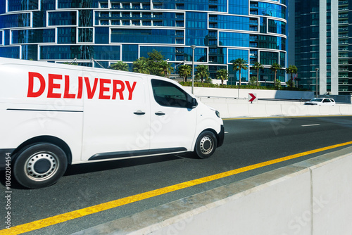 Photography A delivery van travelling through the city streets at Dubai, UAE.