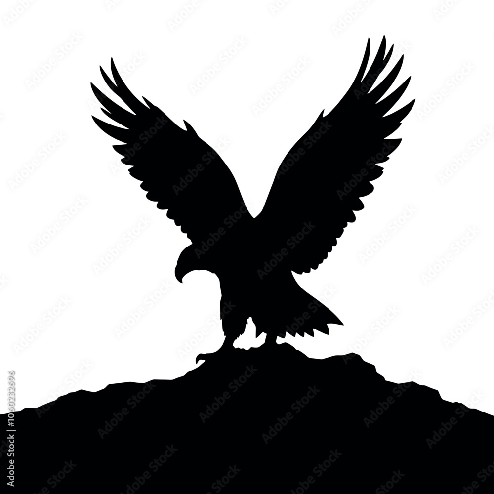 Obraz premium a Golden eagle sitting on the ground silhouette
