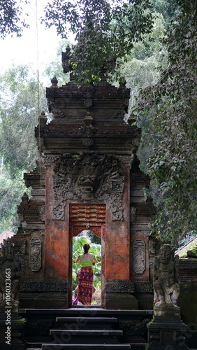 Women in Bali temple gateway