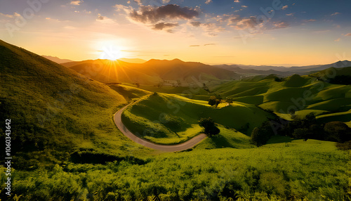 inding Road Through Lush Green Hills at Sunset