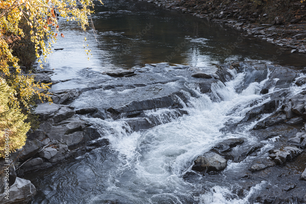 autumn waterfall mountain river in Yaremche Ukrainian Carpathians