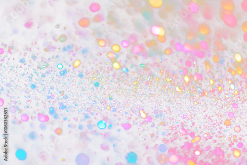 Abstract transparent background with colorful glitter bokeh.