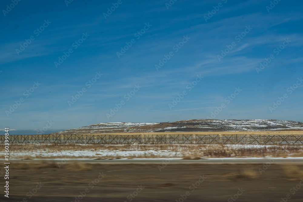 The open fields of Colorado, blanketed in snow, offer a peaceful stillness that soothes the soul, Colorado, United States of America The open fields of Colorado, blanketed in snow, offer a peaceful stillness that soothes the soul, Colorado, United States of America