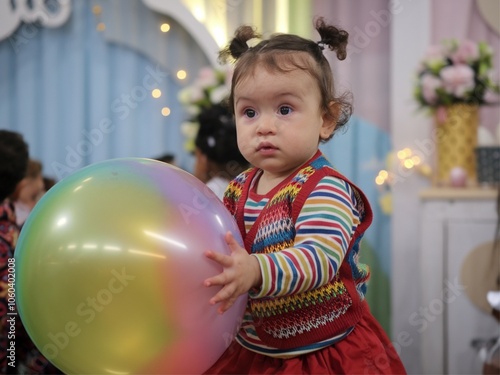 child with balloons