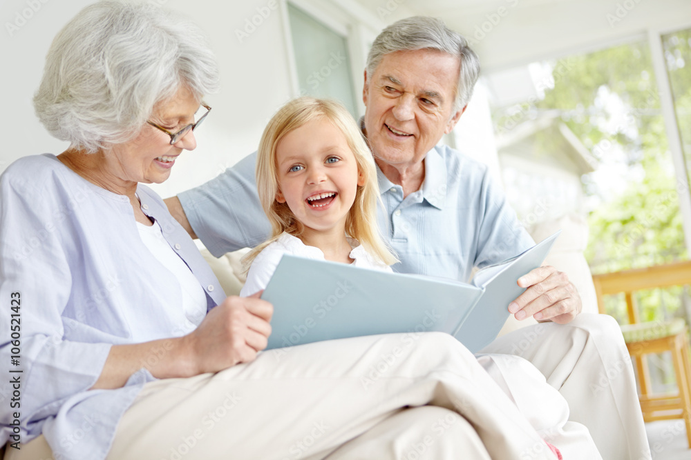 Grandparents, excited and girl reading book in home for learning, bonding and knowledge together. Grandma, grandfather and happy kid storytelling in family house for fairytale, fantasy or development Grandparents, excited and girl reading book in home for learning, bonding and knowledge together. Grandma, grandfather and happy kid storytelling in family house for fairytale, fantasy or development