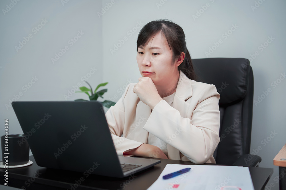 Asian business woman thinking about work Asian business woman thinking about work