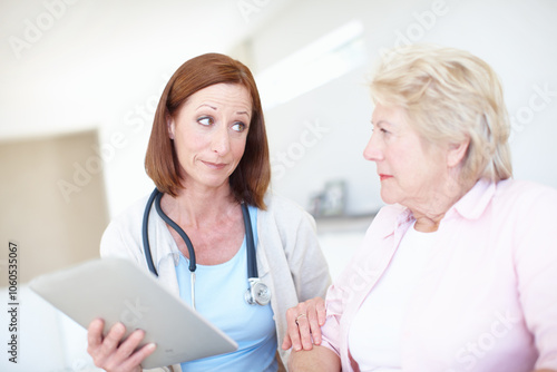 Healthcare, senior patient and doctor with tablet for consultation, medical information or advice. Women, elderly person and surgeon with digital for test feedback for diagnosis, treatment or results