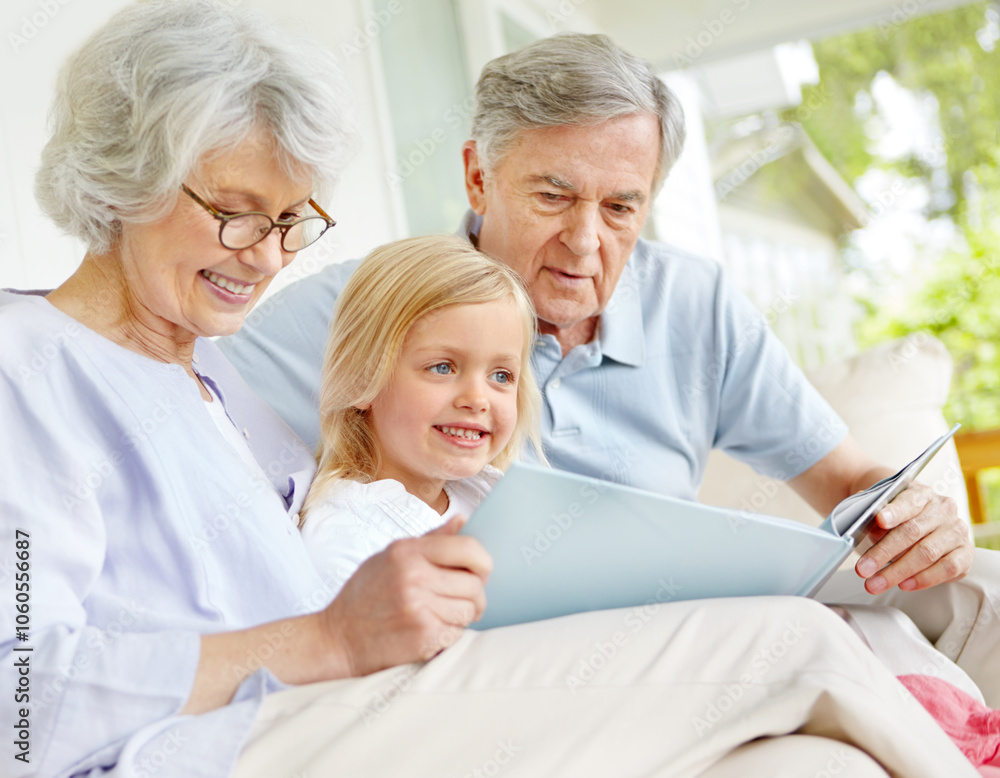Grandparents, happy and girl reading book in home for learning, bonding and knowledge together. Grandma, grandfather and kid storytelling in family house for fairytale, fantasy or child development Grandparents, happy and girl reading book in home for learning, bonding and knowledge together. Grandma, grandfather and kid storytelling in family house for fairytale, fantasy or child development