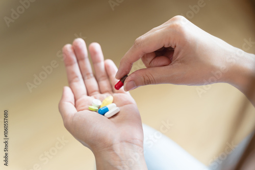 Healthcare Harmony: Close-Up Hands Holding Medication and Water Glass for Optimal Wellness, Pharmaceutical Treatment and mental health treatment photo