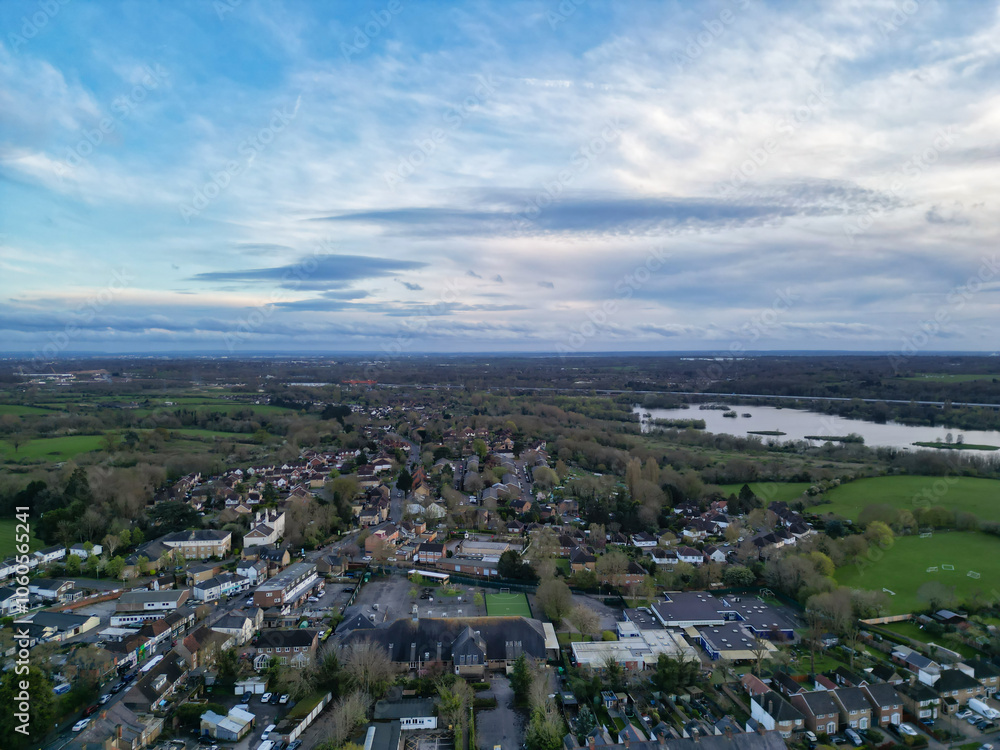 Fototapeta premium High Angle View of Harefield Town London, Uxbridge, England, United Kingdom During Sunset. Aerial Footage Was Captured with Drone's Camera from Medium High Altitude on April 3rd, 2024