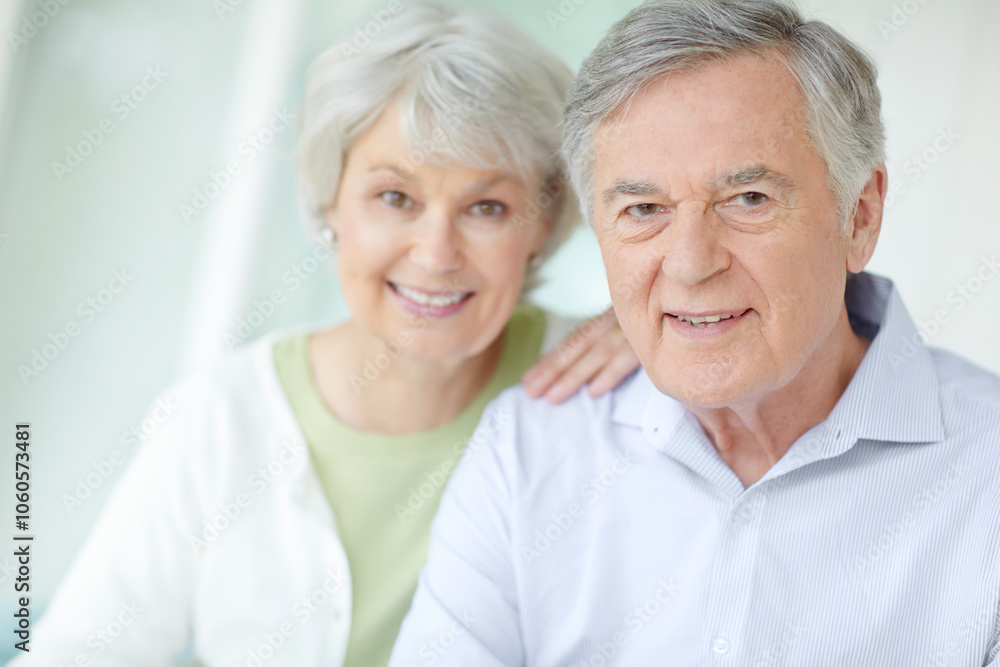 Portrait, smile and senior couple in home with love for romantic connection on weekend together. Elderly man, woman and relax with happiness in house for retirement support, joy and marriage bonding Portrait, smile and senior couple in home with love for romantic connection on weekend together. Elderly man, woman and relax with happiness in house for retirement support, joy and marriage bonding