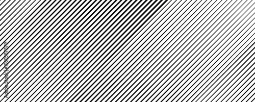 Tapered black diagonal lines on a white background. Slanted parallel line print. Slanted straight lines with gradient or halftone effects.