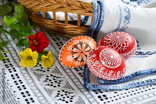 Easter - beautiful colorful Easter eggs - Czech tradition of decorating with wax, classic still life with Easter eggs and spring flowers,