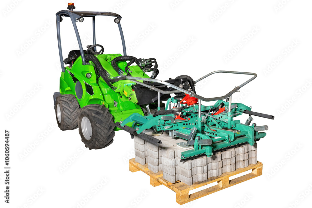 Powerful loader lifting heavy concrete blocks with industrial machine on pallet. Isolated white background. Construction equipment concept.