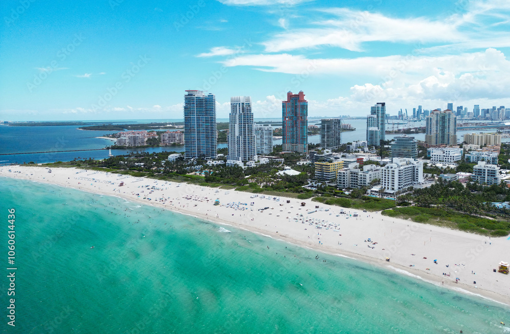 Aerial view of South Pointe Park. Miami Beach. Florida. USA. Summer holidays in Miami Beach. Aerial panoramic view of the city of Miami, buildings, marina, yachts and luxurious apartments. Aerial view of South Pointe Park. Miami Beach. Florida. USA. Summer holidays in Miami Beach. Aerial panoramic view of the city of Miami, buildings, marina, yachts and luxurious apartments.