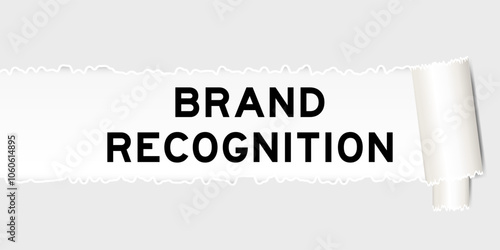Ripped gray paper background that have word brand recognition under torn part