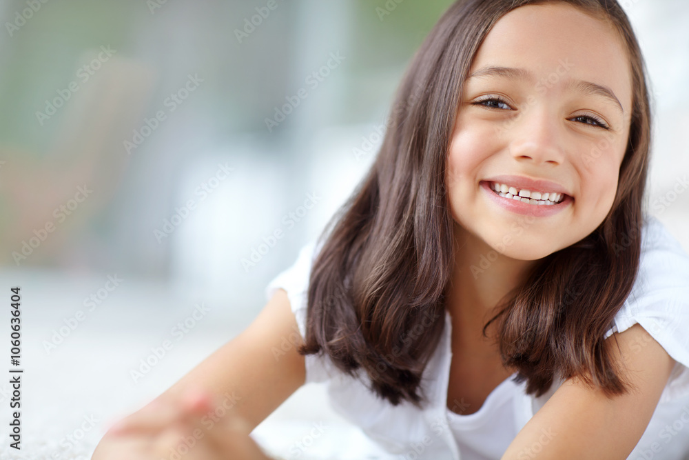 Home, relax and portrait of child with smile for weekend break, development and fun in living room. Happy, kid and little girl on carpet in house for resting, satisfaction and growth in Colombia Home, relax and portrait of child with smile for weekend break, development and fun in living room. Happy, kid and little girl on carpet in house for resting, satisfaction and growth in Colombia