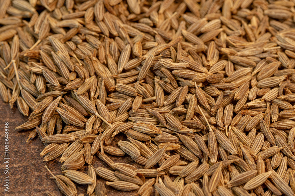 pile of cumin close up, macro photo pile of cumin close up, macro photo
