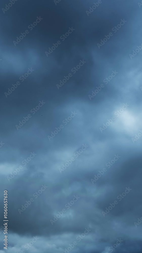 Dramatic dark storm clouds are moving fast, timelapse. Vertical video Dramatic dark storm clouds are moving fast, timelapse. Vertical video