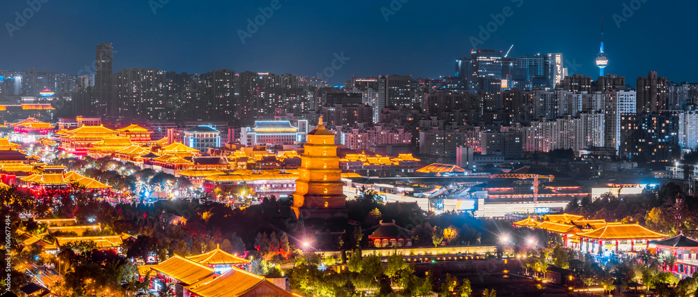 Naklejka premium High Anlge View of urban skyline night view of the Big Wild Goose Pagoda in Xi'an, Shaanxi, China