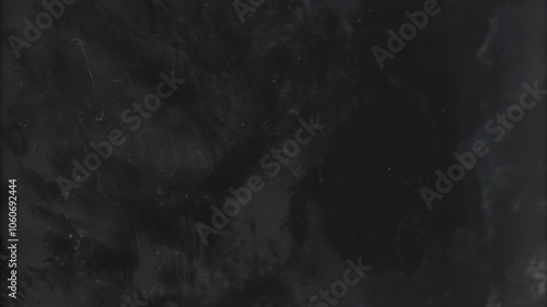 Abstract Dark Texture with Subtle Light Patterns