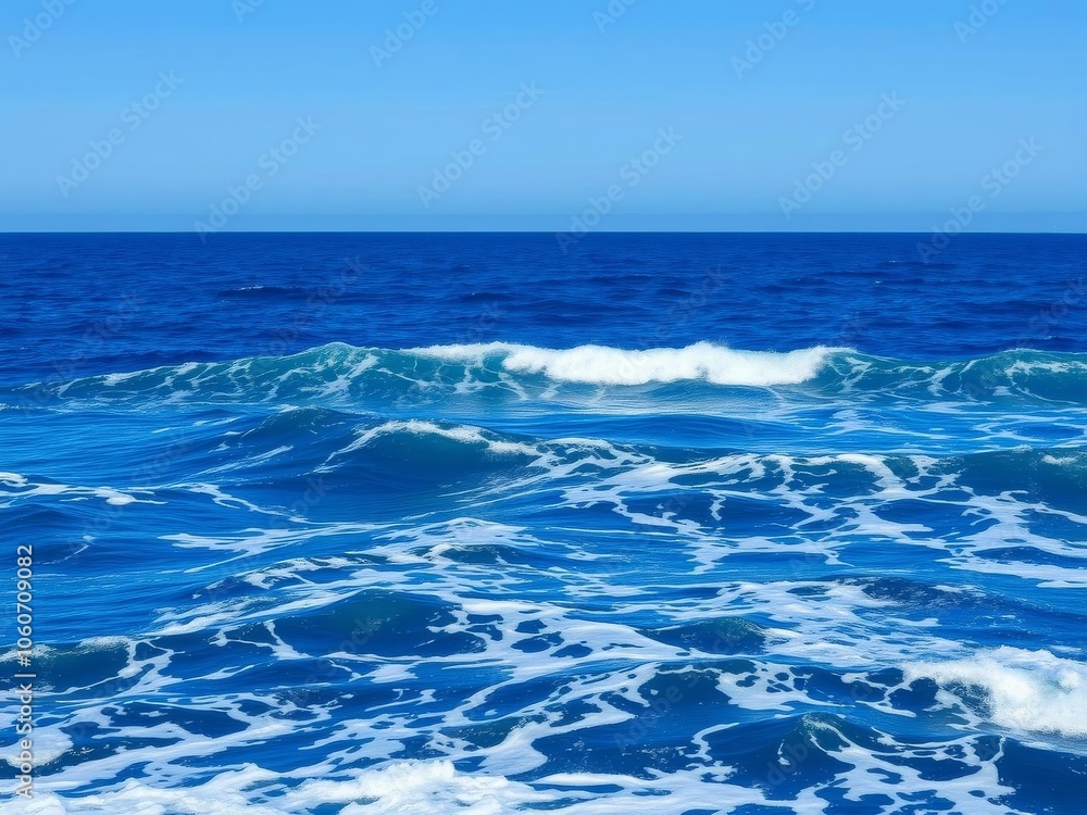 A vast expanse of deep blue ocean with crashing waves and clear skies, coast, sea A vast expanse of deep blue ocean with crashing waves and clear skies, coast, sea