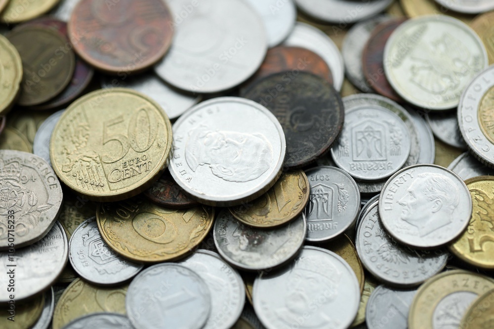 Big pile of different coins from various currencies and different countries around the world. Currency exchange Big pile of different coins from various currencies and different countries around the world. Currency exchange