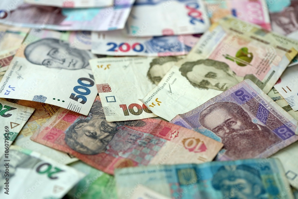 Big amount of different ukrainian hryvnia currency money bills in pile Big amount of different ukrainian hryvnia currency money bills in pile