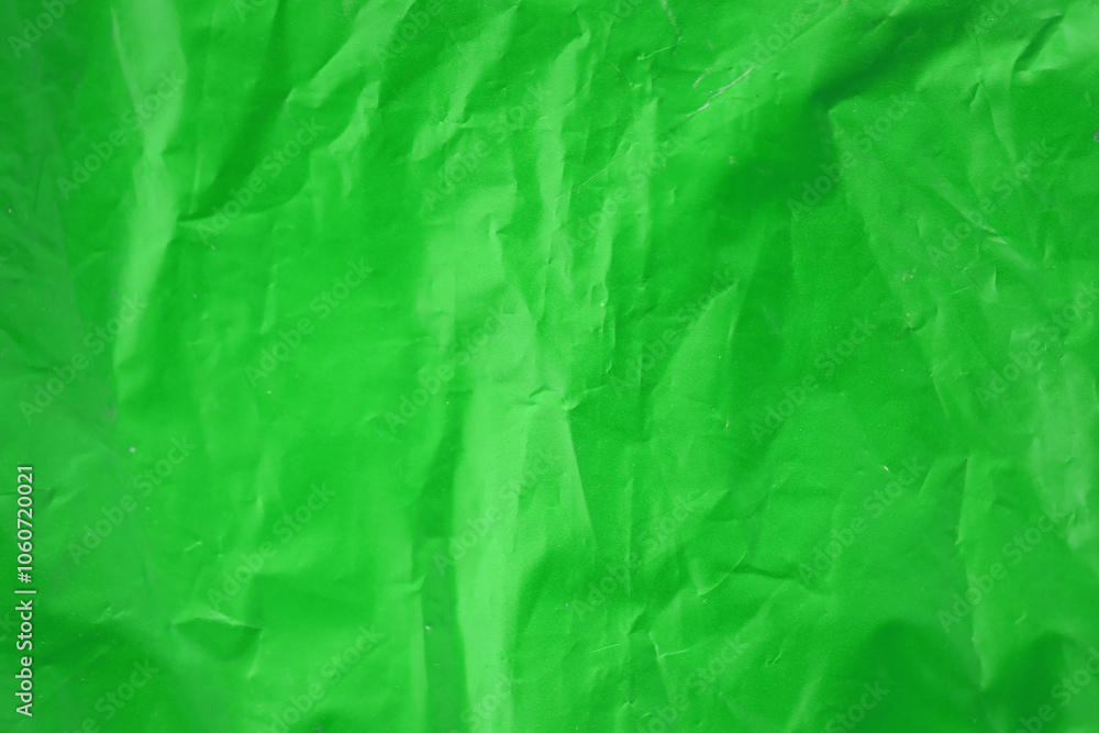 Texture of Green color plastic bag smooth crumpled surface Texture of Green color plastic bag smooth crumpled surface