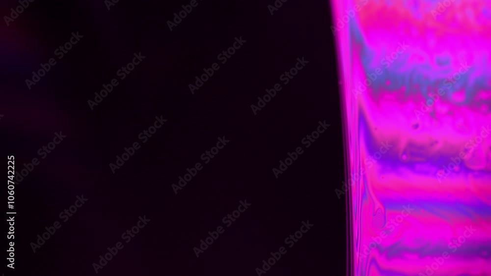 Pink liquid line on dark background, bright sphere, Fantastic liquid background, dark minimalistic art, pink on black, copy space, vertical background Pink liquid line on dark background, bright sphere, Fantastic liquid background, dark minimalistic art, pink on black, copy space, vertical background