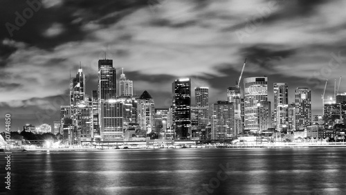 Photography Sydney Skyline Illuminated at Night with Reflective Harbor Waters