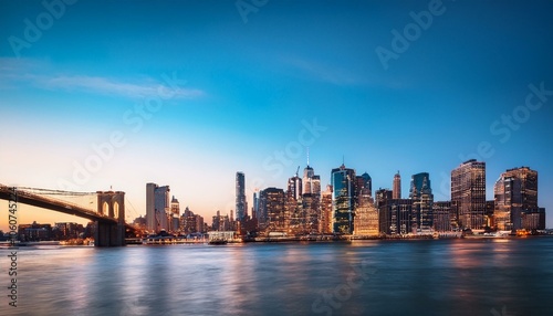 Manhattan skyline at dusk over the river, New York City.