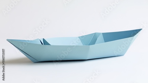 Pristine Folded Paper Boat Floating on White Background