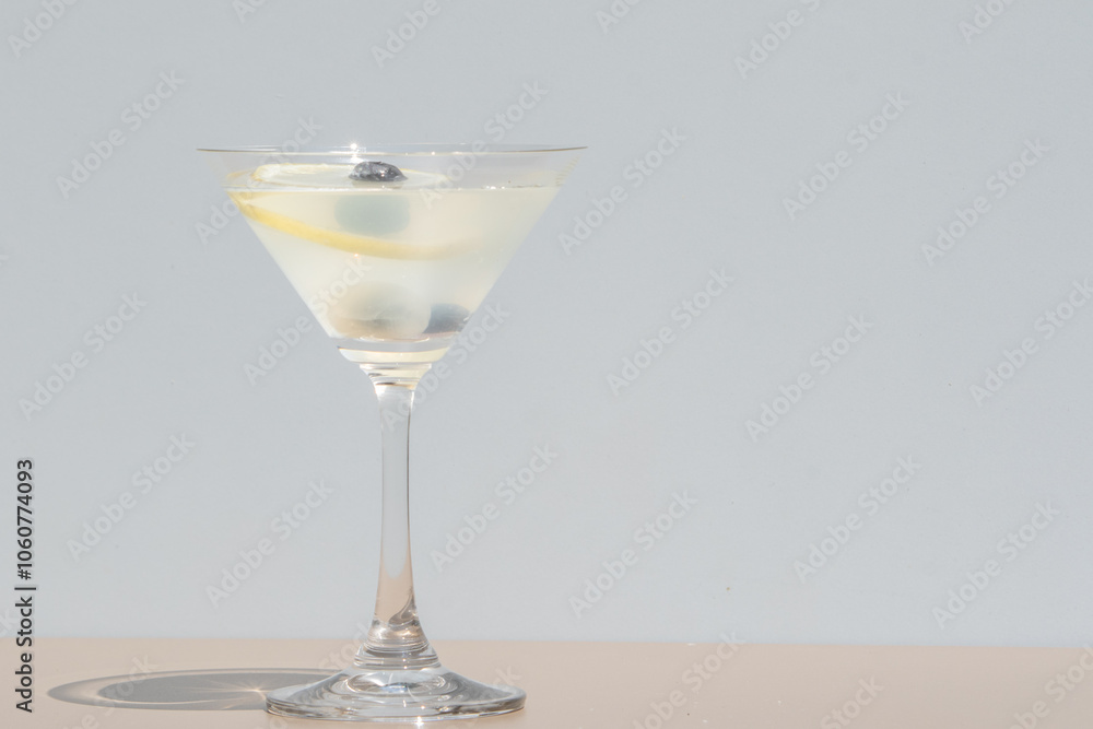 Cocktail garnished with berry, front view