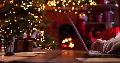 Santa Claus Answering Emails. Santa's Residence on Christmas Eve. Holiday online shopping sale concept