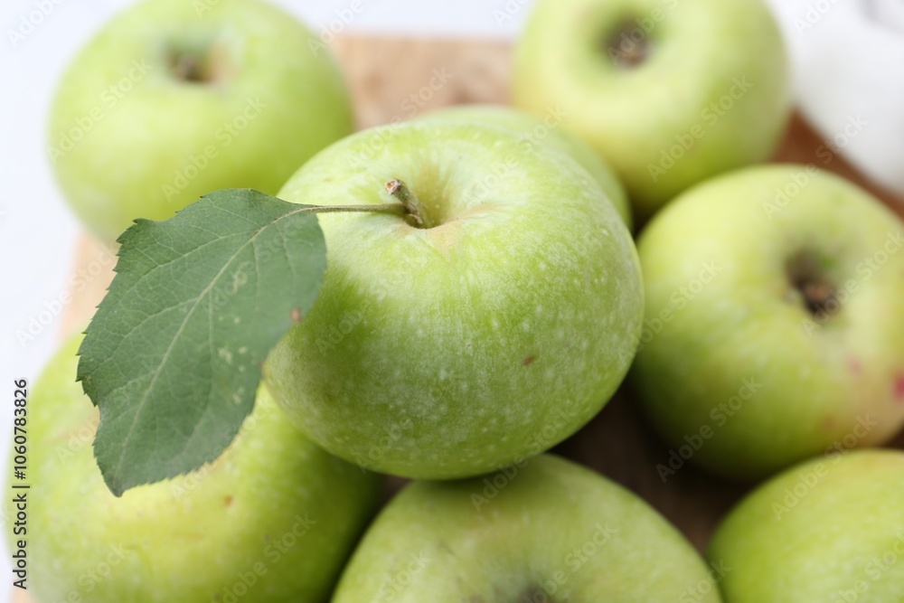 Fresh ripe green apples on table, closeup Fresh ripe green apples on table, closeup