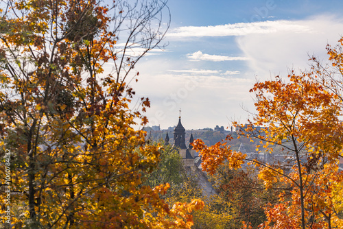 View on Lviv through autumn leaves