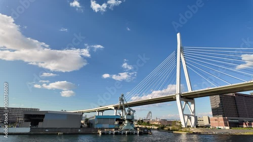 Osaka, Japan; 11 10 2024: Tower, cables and deck of Tempozan Bridge. It is a cable-stayed bridge with harp design photo