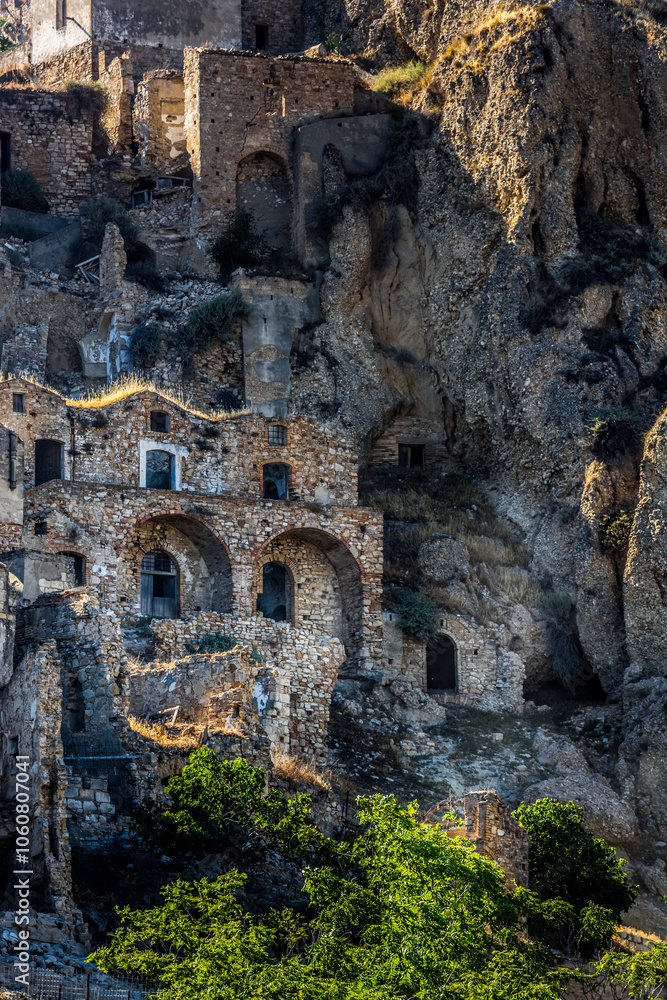 Abandoned ruins of the ghost town of Craco. A city abandoned due to an earthquake in the late 20th century. Province of Matera, Basilicata, Italy