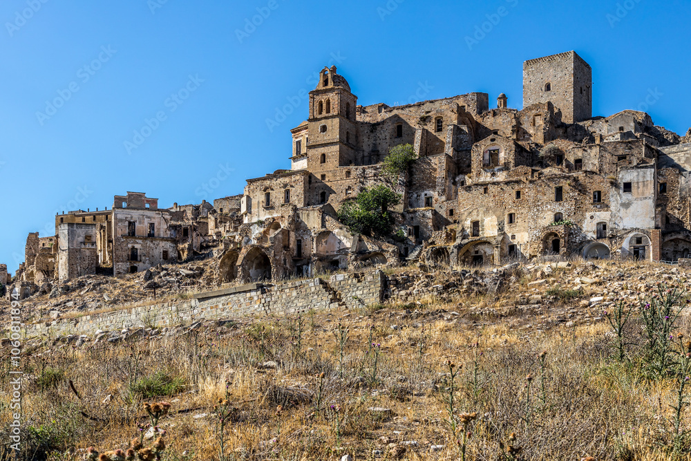 Abandoned ruins of the ghost town of Craco. A city abandoned due to an earthquake in the late 20th century. Province of Matera, Basilicata, Italy