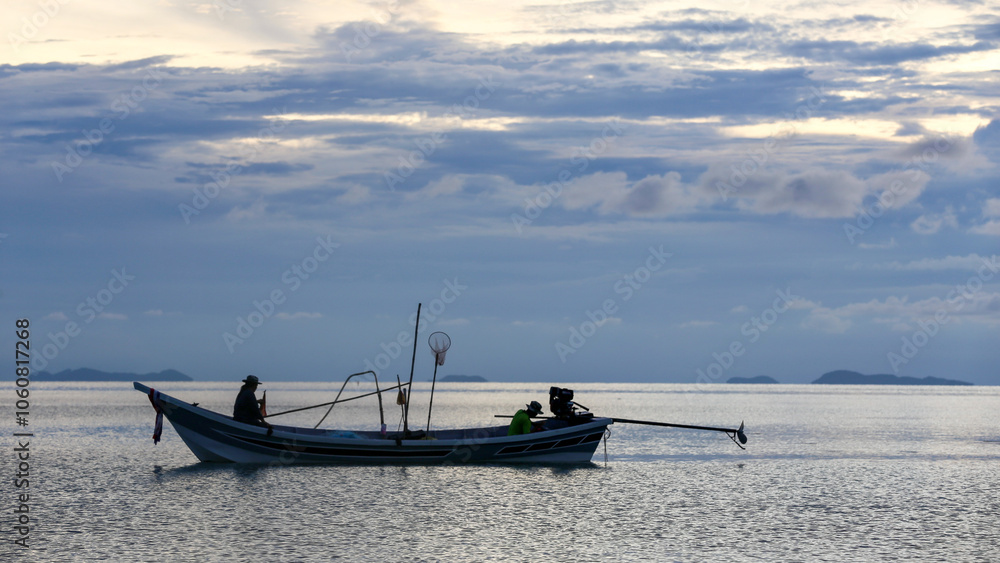 Tranquil Sea at Sunset with Squid Fishing Boat in Action
Tranquil Sea at Sunset with Squid Fishing Boat in Action