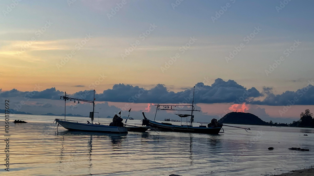 Tranquil Sea at Sunset with Squid Fishing Boat in Action
Tranquil Sea at Sunset with Squid Fishing Boat in Action