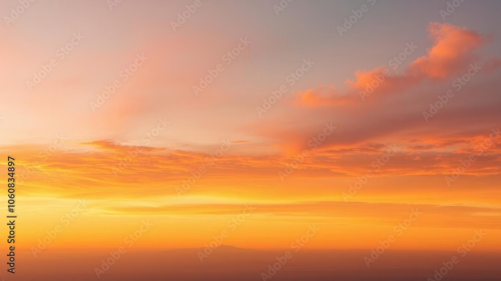 Fototapeta premium Vibrant sunset over the horizon with colorful clouds reflecting the light, yellow, colorful