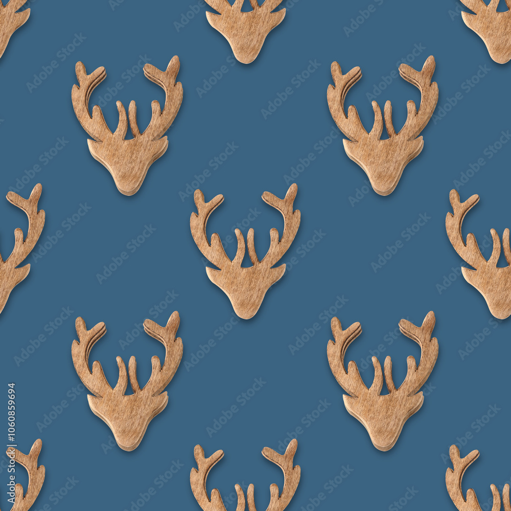 Fototapeta premium Seamless pattern of Christmas wooden reindeer on neutral beige background in Scandinavian style. Xmas scandi abstract wallpaper for fabric prints or wrapping paper.