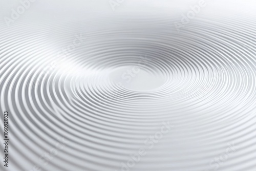 Abstract white concentric circles create a calming and mesmerizing visual effect.