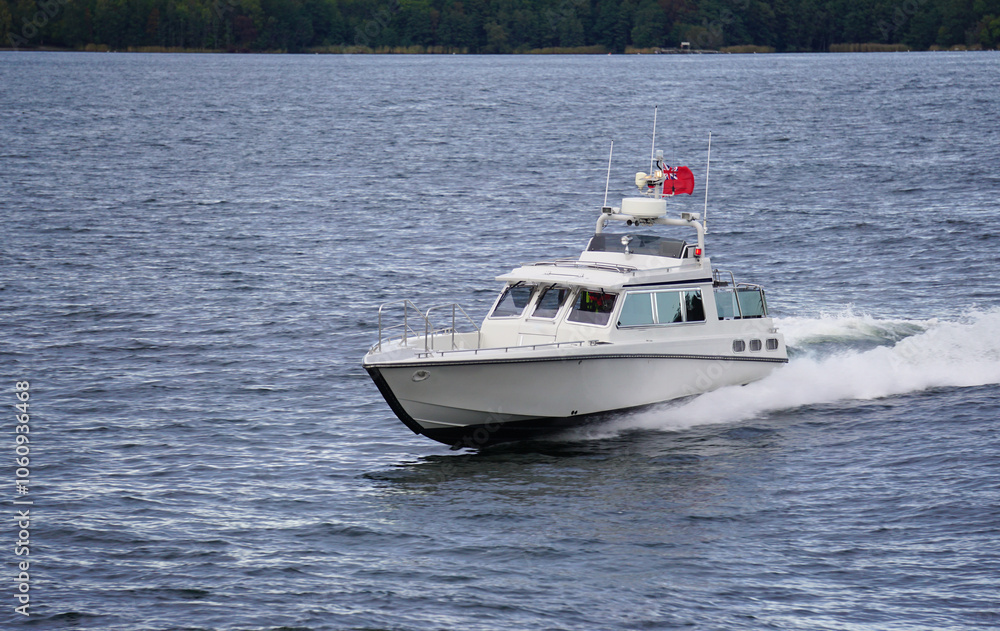 A small boat traveling the sea A small boat traveling the sea