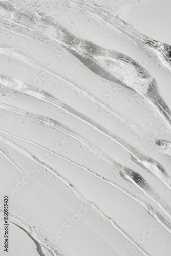 Transparent hair gel texture. Liquid cosmetic background. Serum smudge skin care concept