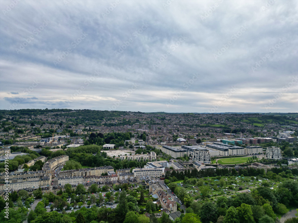 Fototapeta premium High Angle View of Historical Bath City of England United Kingdom During Mostly Cloudy Day of May 26th, 2024, Aerial Footage Was Captured with Drone's Camera During Bright Sunny Day