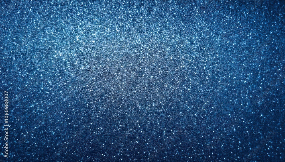 Obraz premium Blue Sparkling Texture of Glitter Particles in Soft Focus. Abstract Background for Winter, Festive, or Cosmic Themed Designs, Ideal for Website Banners, Invitations, or Seasonal Graphics