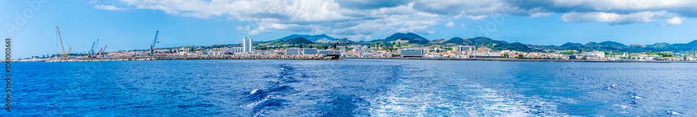 Fototapeta premium A panorama view along the coast at Ponta Delgada on the island of San Miguel in the Azores in summertime